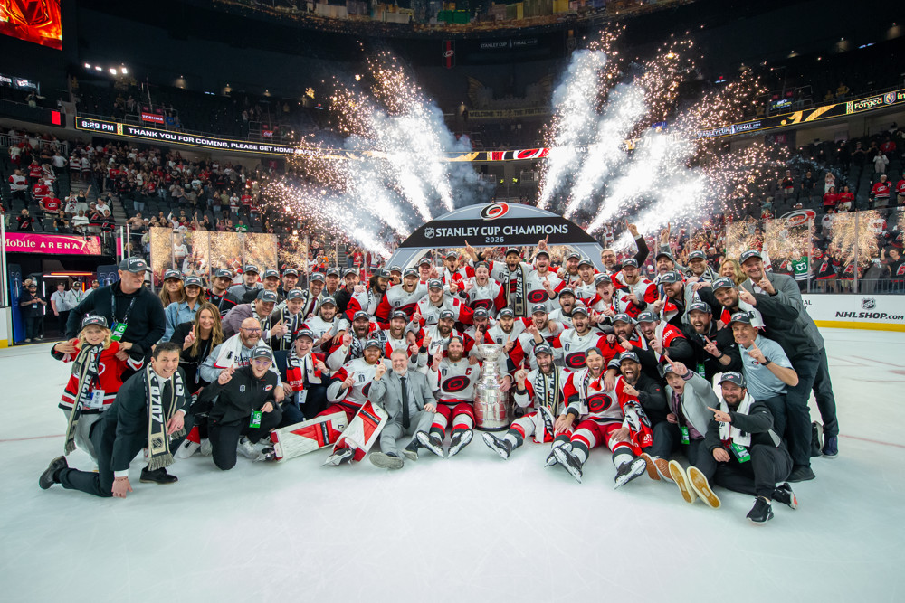 Carolina Hurricanes team photo with the Stanley Cup at T-Mobile Arena in Las Vegas, June 14, 2026
